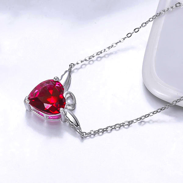 Red crystal angel heart on a silver necklace display