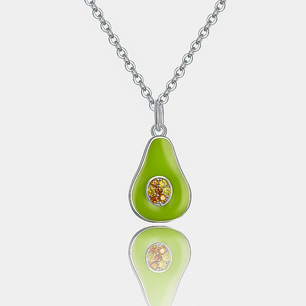 Green avocado fruit pendant on a silver necklace details