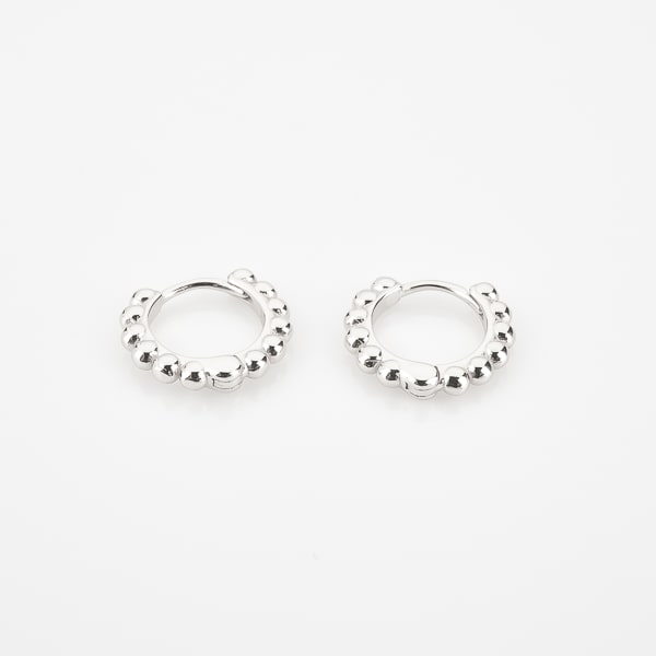 Silver bead mini huggie hoop earrings detail