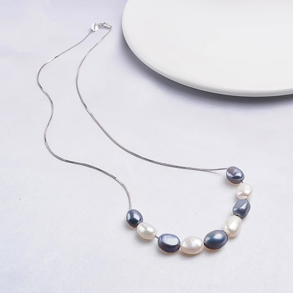 6-7mm black and white baroque freshwater pearls on a necklace