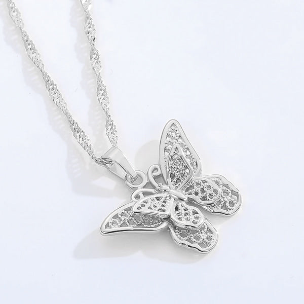 Silver butterfly necklace on a Singapore chain details