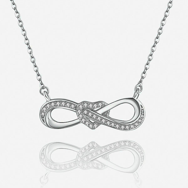 Silver infinity necklace with a heart knot and crystal trim details