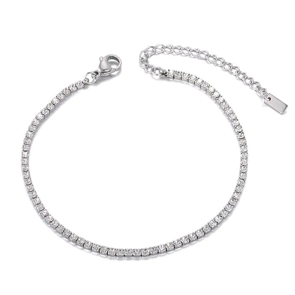 Silver crystal tennis anklet on a white background