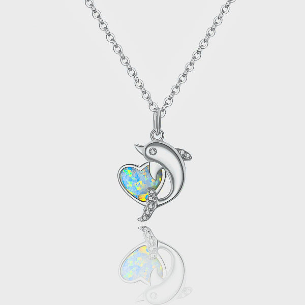 Silver dolphin and opal heart pendant necklace details
