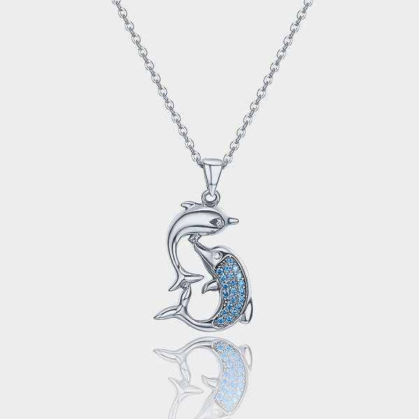 Dolphin pendant on a silver necklace details