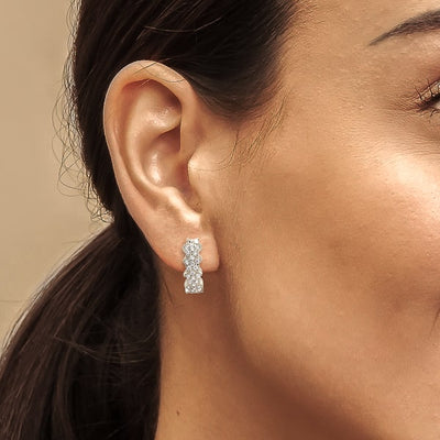 Silver flower pavé hoop earrings