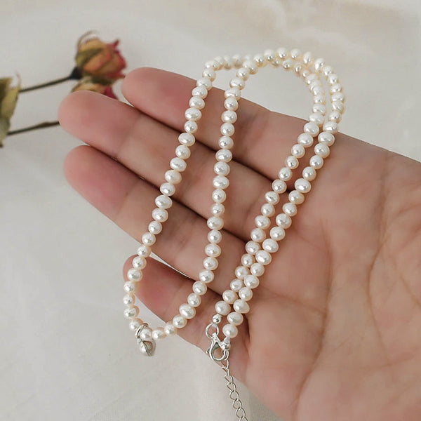 3-4mm freshwater pearl necklace with a silver heart detailed view