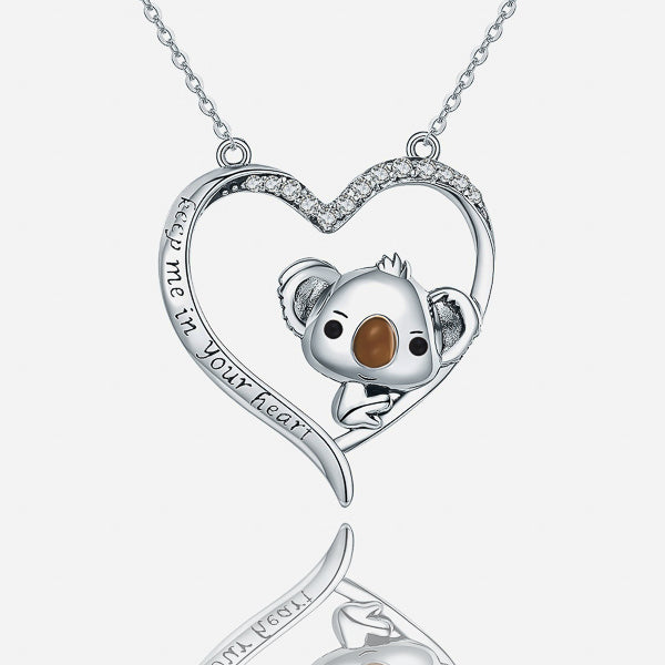 Silver koala and heart necklace details