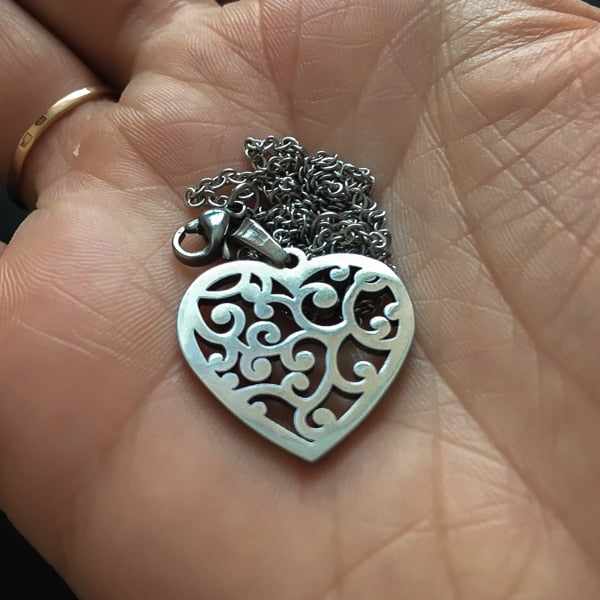 Silver mycelium heart pendant necklace display