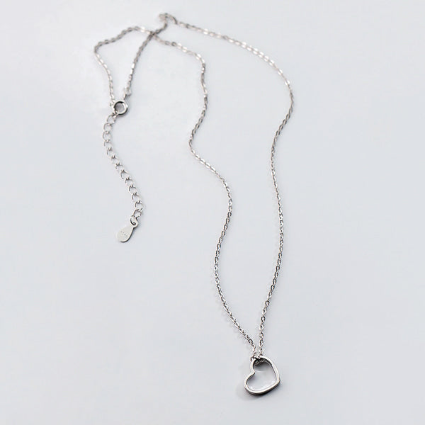 Silver open heart choker necklace display