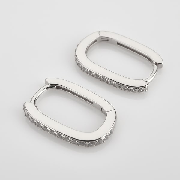 Silver oval crystal hoop earrings details