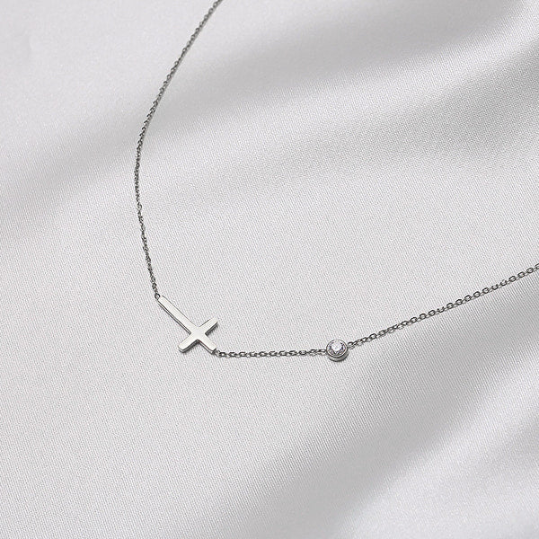 Silver sideways cross necklace details