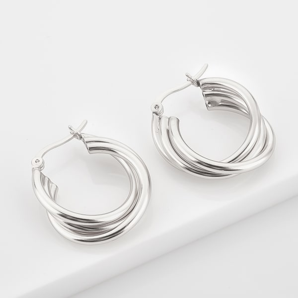 Silver triple twist hoop earrings detail