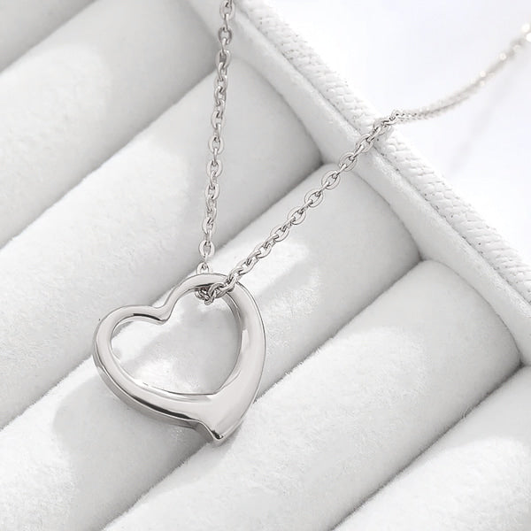 Silver wavy open heart pendant necklace display