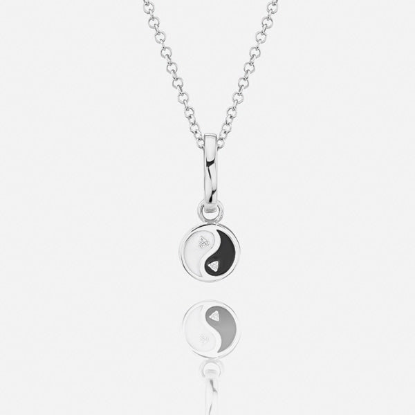 Silver yin yang necklace display