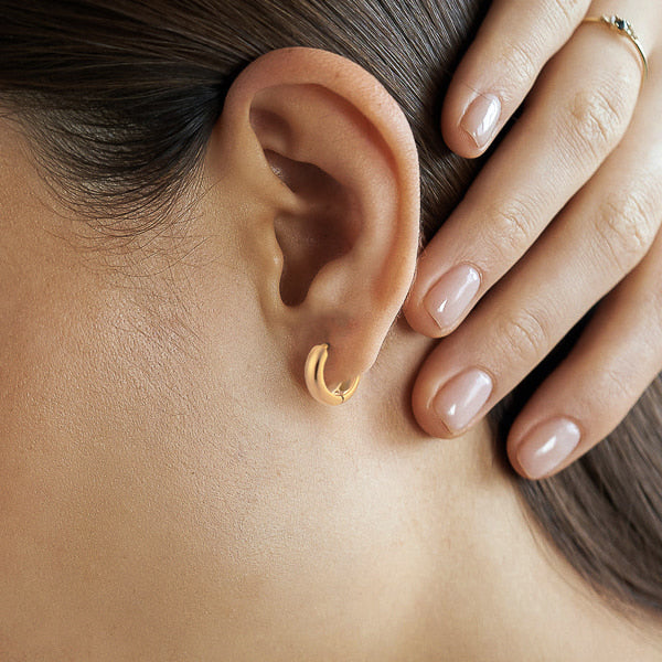 Small gold huggie hoop earrings