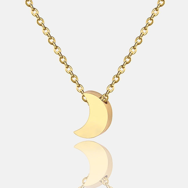 Small gold moon necklace details