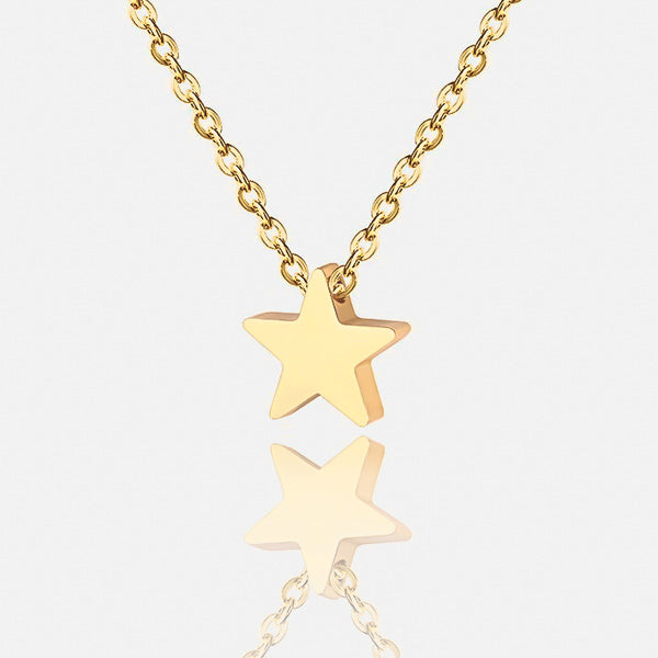 Small gold star necklace details