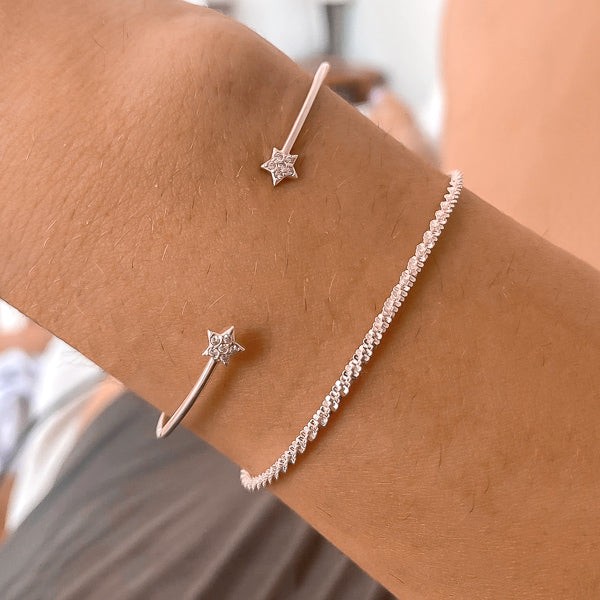 Woman wearing a sparkling sterling silver chain bracelet