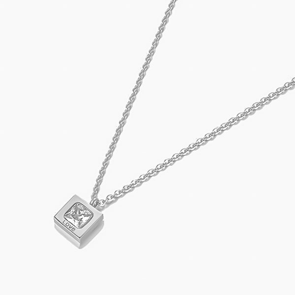 Square silver pendant on a dainty chain