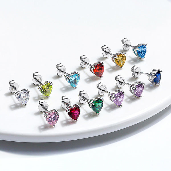 Sterling silver stud earrings with sky blue heart-shaped cubic zirconia