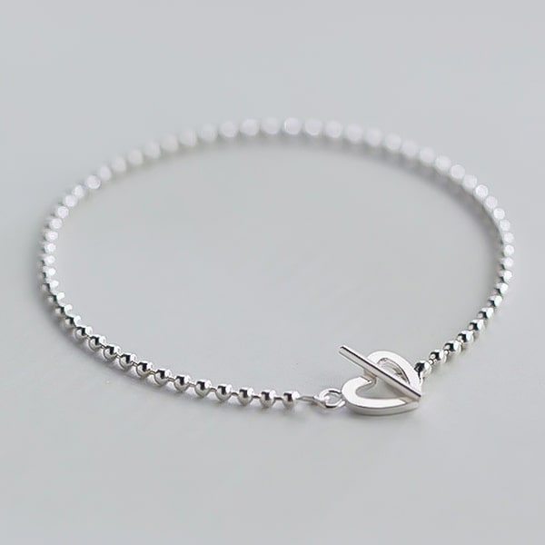 Sterling silver beaded heart bracelet close up