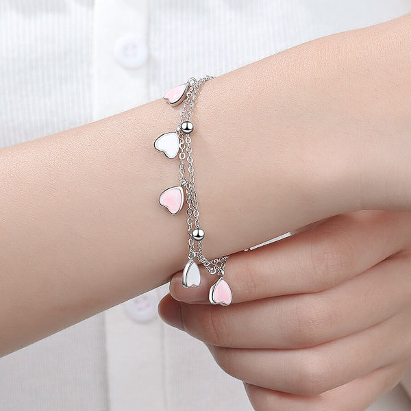 Sterling silver cherry blossom bracelet on woman's wrist