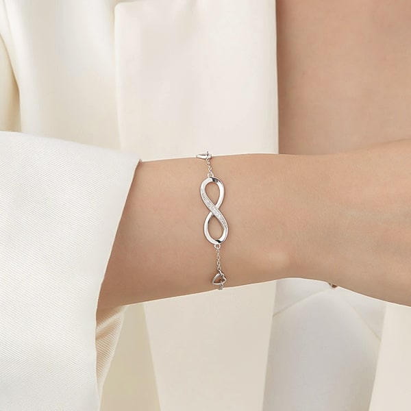 Sterling silver infinity bracelet on a woman's wrist