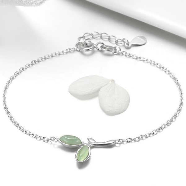 Details of the sterling silver leaf bracelet with green opals 