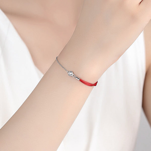 Sterling silver red rope bracelet on woman's wrist
