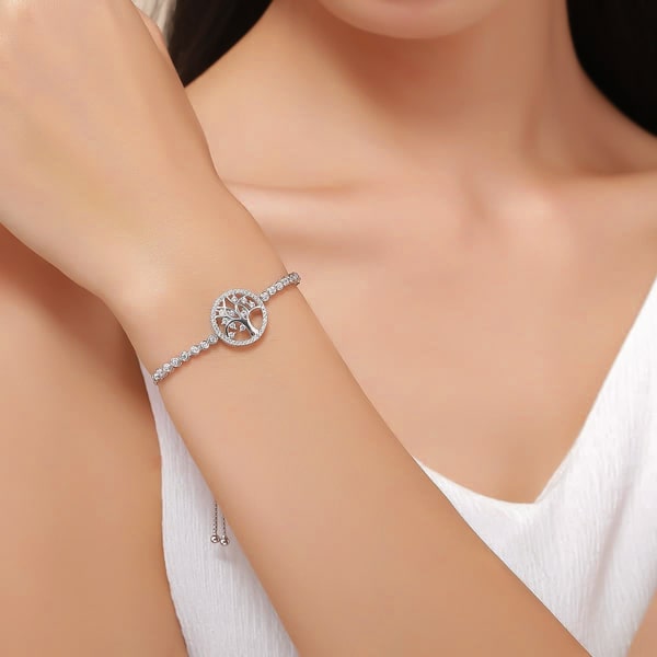 Sterling silver tree of life bracelet on a woman's wrist