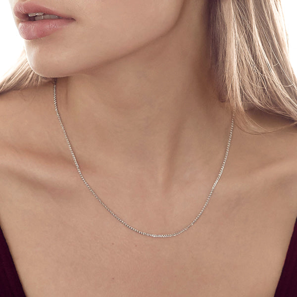 Woman wearing sterling silver wheat chain necklace