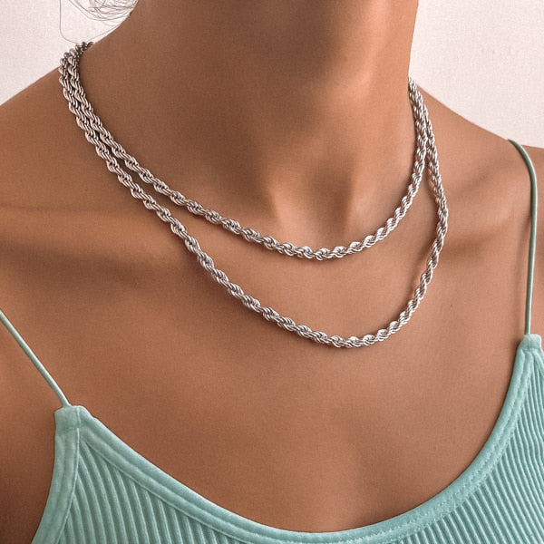 Woman wearing a thick 5mm silver rope chain necklace