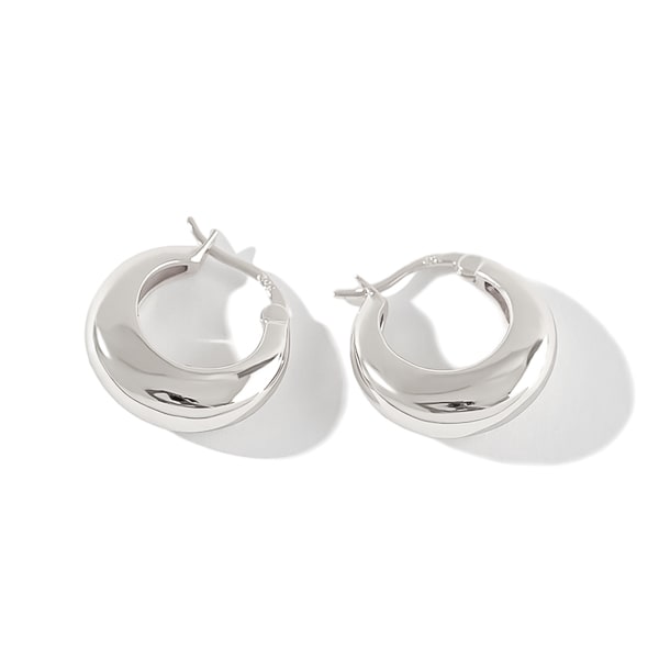 Thick silver teardrop huggie hoop earrings detail