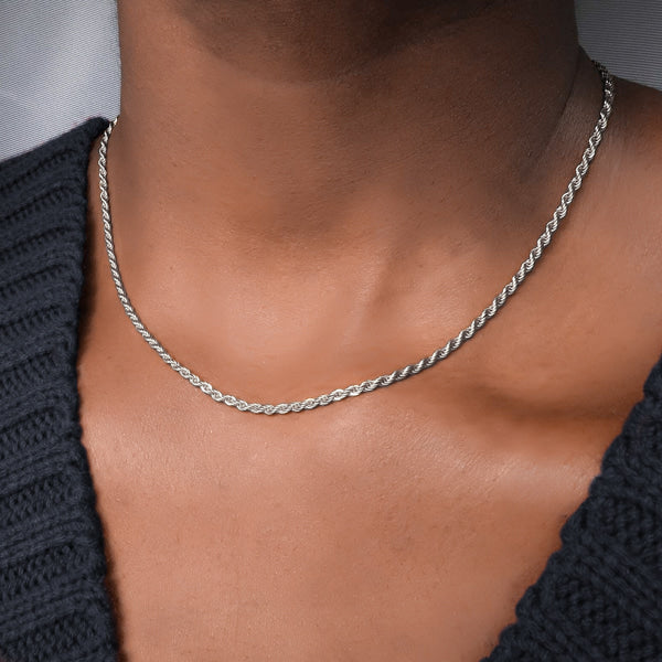 Woman wearing a thin 2mm silver rope chain necklace