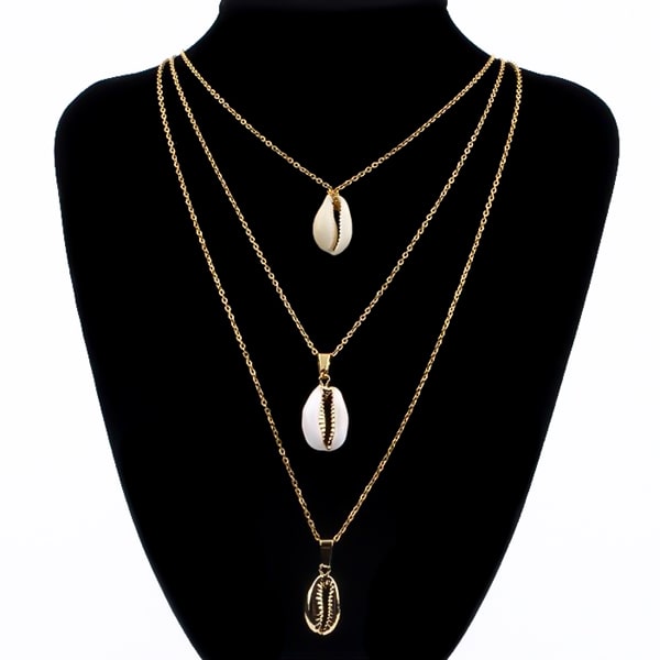 Gold layered shell necklace with cowrie seashells