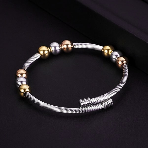 Cuff bracelet with silver, gold, and rose gold three-tone beads