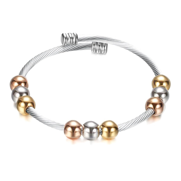 Three tone cuff bracelet with silver, gold, and rose gold beads