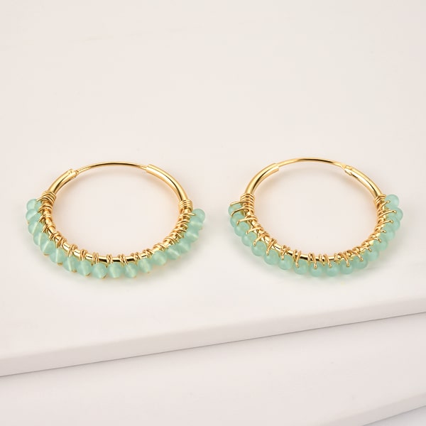 Turquoise bead hoop earrings detail