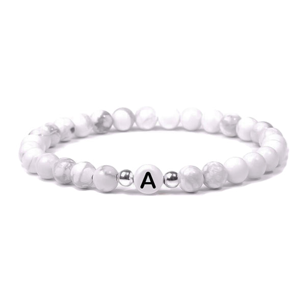 White beaded initial letter bracelet