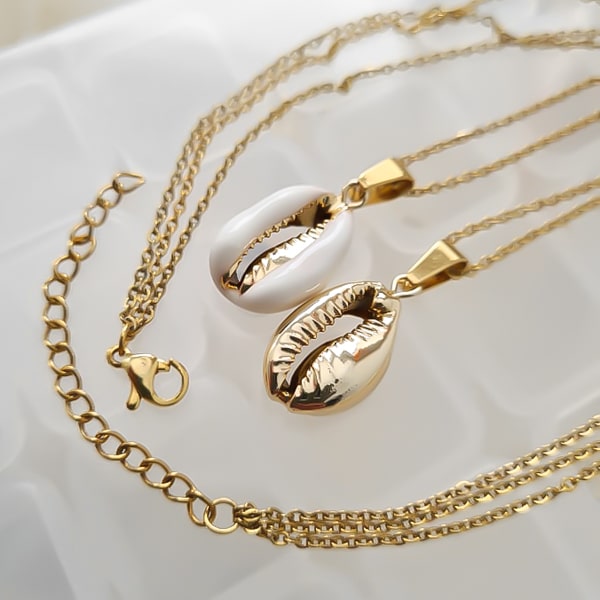 Gold layered cowrie shell necklace