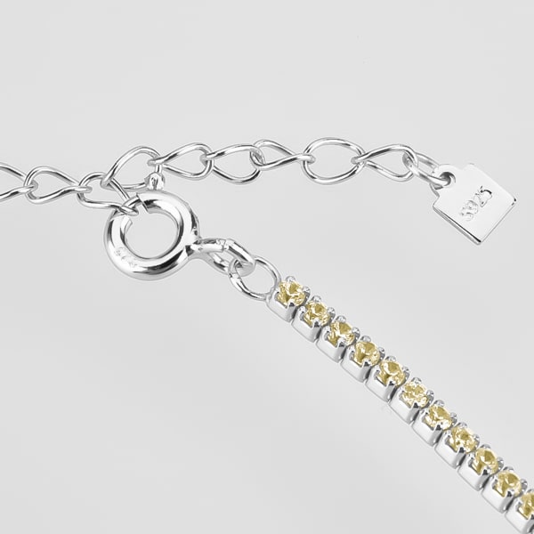 Details of the silver tennis choker necklace with yellow cubic zirconia stones